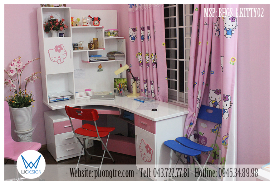 Bàn học chữ L liền giá sách Mèo Hello Kitty dễ thương được đặt áp cửa sổ