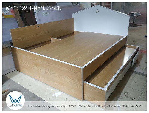 Giường tầng trên là giường 1m6, giường dưới là giường 1m2 có 3 ngăn kéo, phần còn lại của gầm giường làm tủ kho để đồ