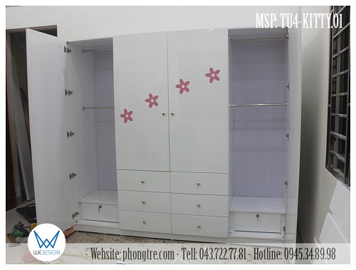 2 buồng tủ 2 bên thiết kế giống nhau đều là buồng tủ để treo quần áo và có hộc ngăn kéo để tiền riêng của bé