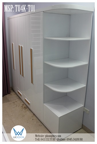 Tủ quần áo màu trắng có tay nắm vân gỗ màu vàng bích của phòng 2 con gái chị Phương Hoa